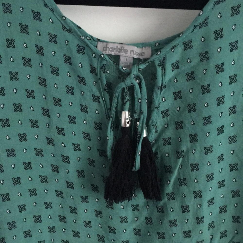 Tassel-tie Peekaboo sleeveless blouse - Picture 2 of 5